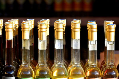 Close-up of wine bottles on table