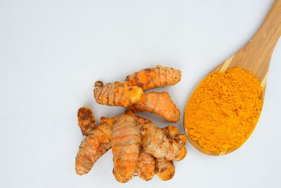 High angle view of food on table against white background