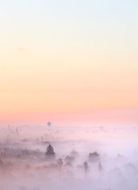 Scenic view of landscape against sky during sunset