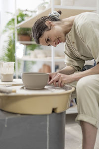 Side view of man working at home