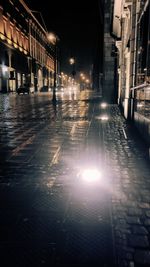 Wet street at night
