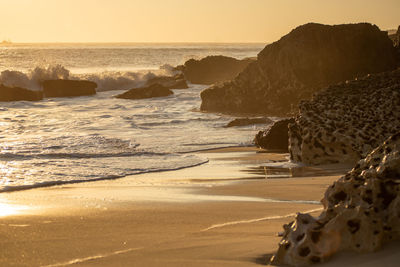 Scenic view of sea against sky during sunset