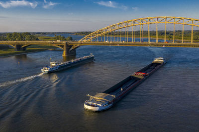 View of bridge over river in city