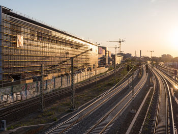 View of berlin and train tracks during golden hour