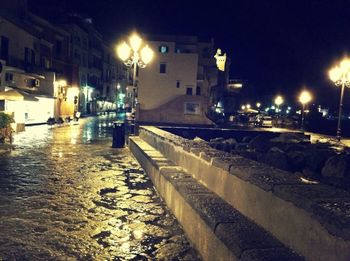 Illuminated street light at night