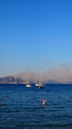 Boat sailing in sea