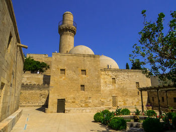 Low angle view of historic building against sky