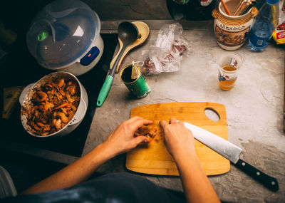 Fried until golden brown tiger shrimp are ready in a pan and serving at the table