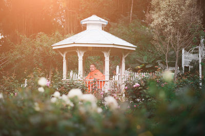 Built structure in garden by building