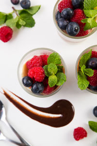 High angle view of strawberries in bowl on table