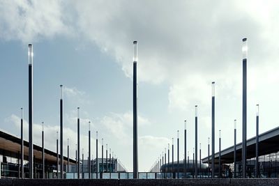 Panoramic view of street lights against sky