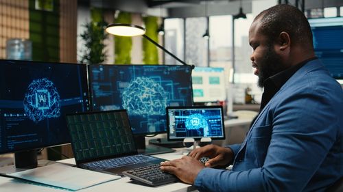 Side view of man working at office