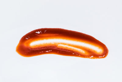 High angle view of tomato against white background