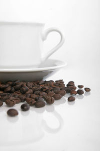 Close-up of coffee cup on table