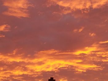 Low angle view of cloudy sky during sunset