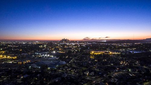 Aerial view of cityscape at night