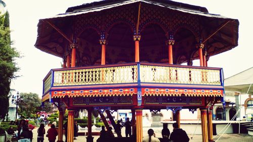 Tourists in front of building