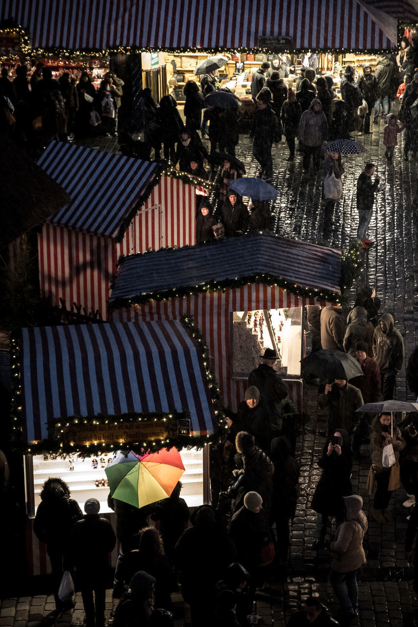 GROUP OF PEOPLE IN MARKET