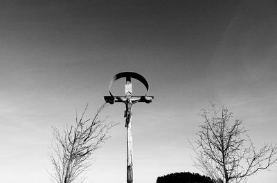 Low angle view of street light against clear sky