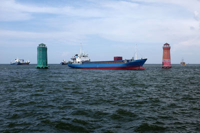 Nautical vessel on sea against sky