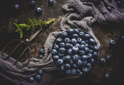 High angle view of blueberries on table