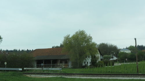 Built structure on landscape against clear sky