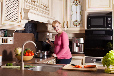 Midsection of man preparing food at home