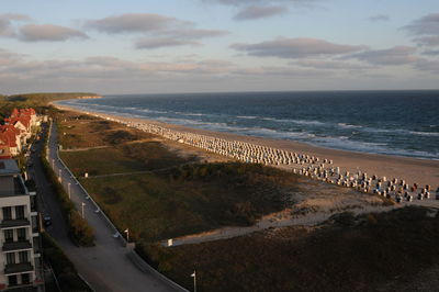 High angle view of beach against sky during sunset