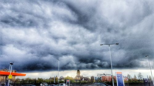 Storm clouds over cloudy sky