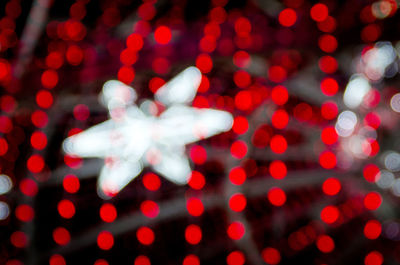 Defocused image of illuminated christmas lights