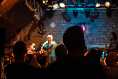 Rear view of people at music concert