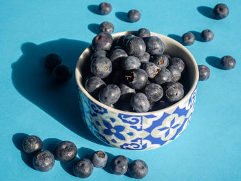 High angle view of fruits in container on table