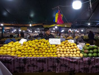 Various fruits for sale at market stall