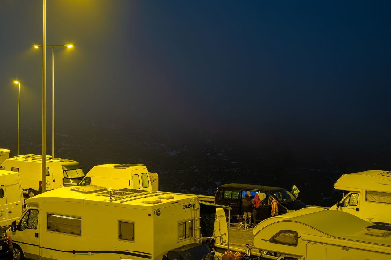 yellow, night, transportation, architecture, nature, sky, mode of transportation, illuminated, no people, vehicle, city, built structure, building exterior, outdoors