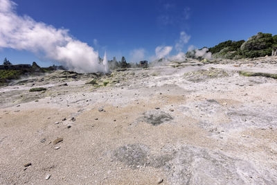 Scenic view of land against sky