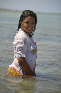 Portrait of a smiling woman in water