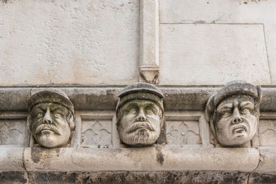 Statue against wall