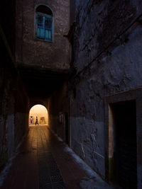 Narrow alley amidst old building