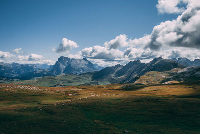 Scenic view of snowcapped mountains against sky