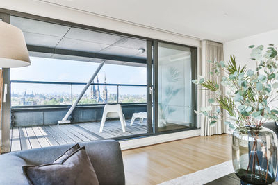 Chairs and table by window at home