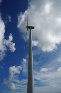 Low angle view of windmill against sky