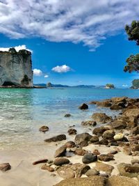 Scenic view of sea against blue sky