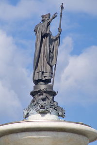 Low angle view of statue against sky