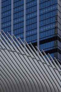 Low angle view of modern building against sky in city