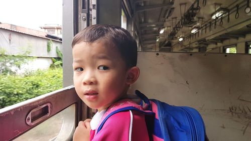 Portrait of boy in car