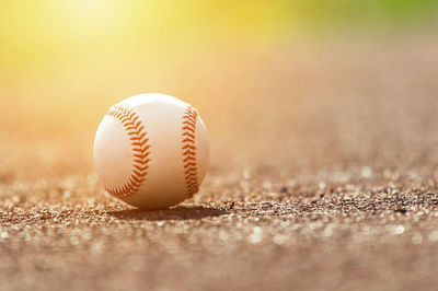 Close-up of ball on road