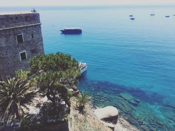 High angle view of sea against blue sky