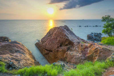 Scenic view of sea against sky during sunset