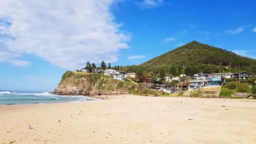 Scenic view of beach against sky