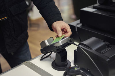 Man paying in department store